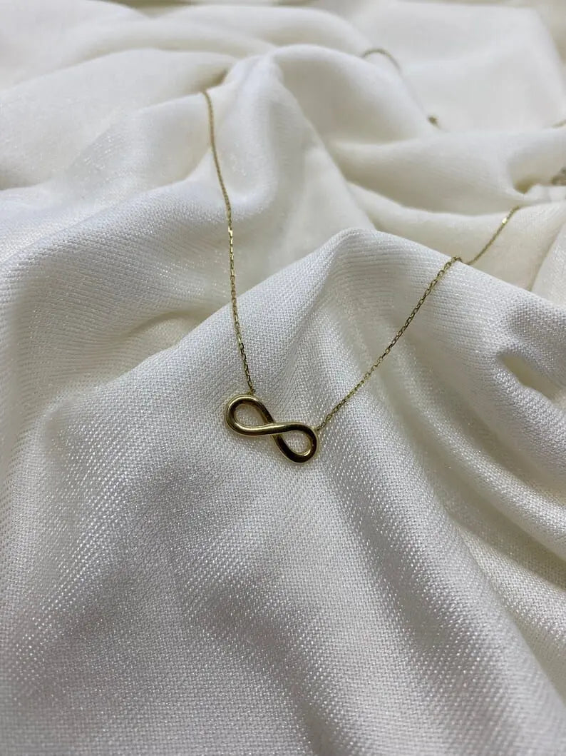 Elegant Gold-Tone Infinity Necklace for Women – Minimalist & Stylish Jewellery - DZOIR