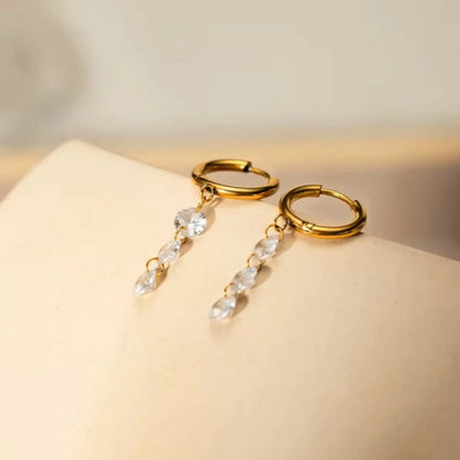 Gold Huggie Hoop Earrings with Dangling Zircon Stones – Elegant Minimalist Jewellery - BELARIC