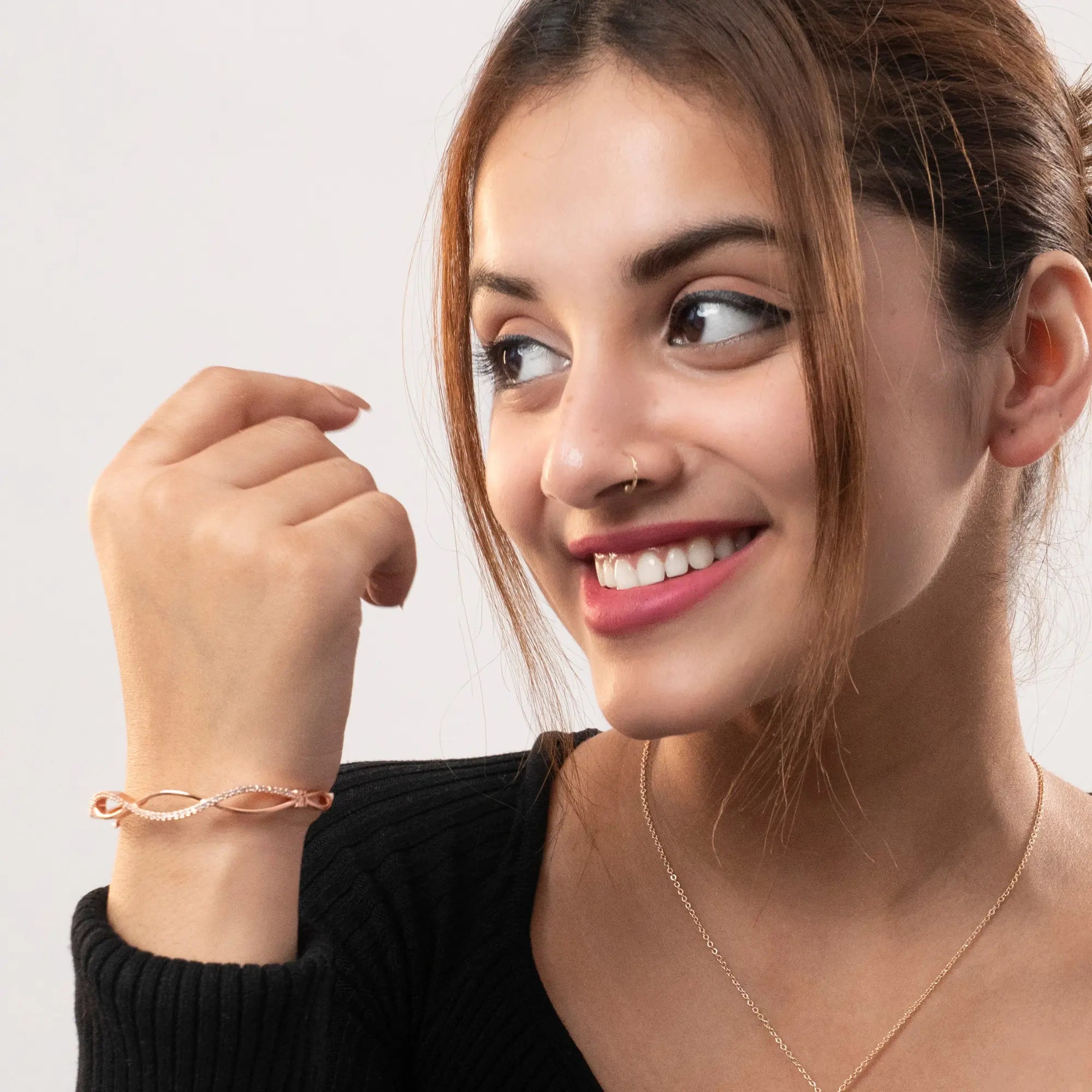 Rose Gold Plated Twisted Infinity Bangle with Sparkling Zircon Stones - DZOIR