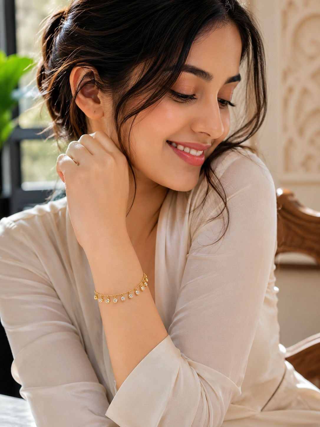 Gold crystal charm bracelet alternate lifestyle view - BELARIC